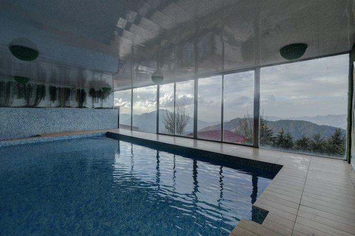 Imagen de la piscina del Hotel Tarika Resort And Spa. Foto 19