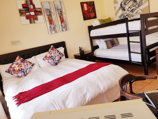 Imagen de la habitación del Hotel Tariman Inn. Foto 9