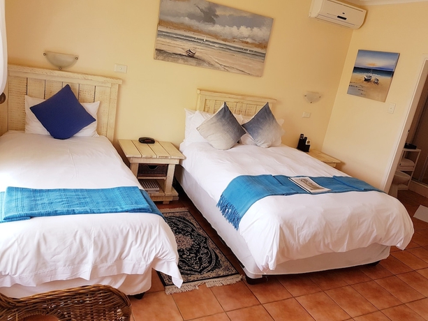 Imagen de la habitación del Hotel Tariman Inn. Foto 10