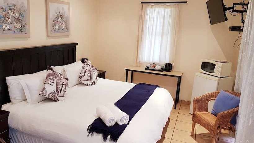 Imagen de la habitación del Hotel Tariman Inn. Foto 12