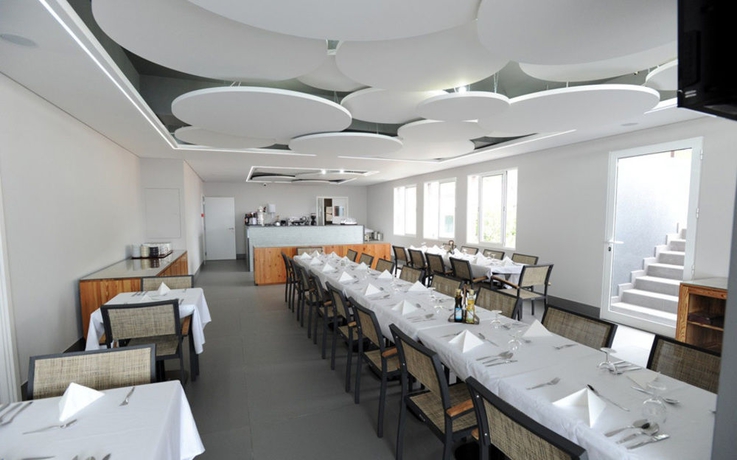 Imagen del bar/restaurante del Hotel TarmarPlace. Foto 5