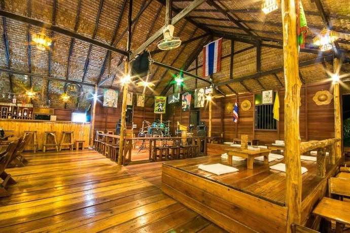 Imagen del bar/restaurante del Hotel Tarzan Island Bungalow. Foto 6