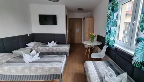 Imagen general del Hotel Tasarz Spa Ośrodek Wczasowy. Foto 7