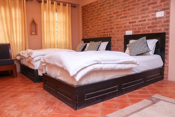 Imagen de la habitación del Hotel Tashi Delek Guest House. Foto 12