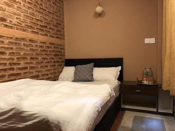 Imagen de la habitación del Hotel Tashi Delek Guest House. Foto 13