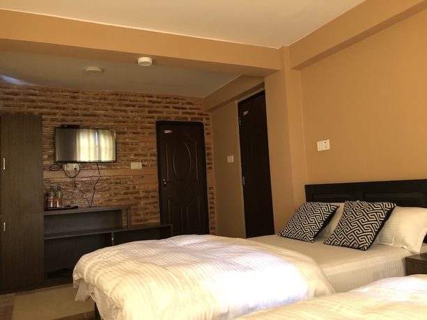 Imagen de la habitación del Hotel Tashi Delek Guest House. Foto 15