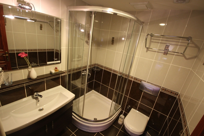 Imagen de la habitación del Hotel Tashkonak Studio Suites. Foto 4