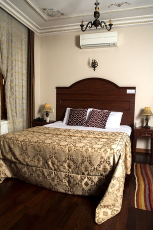 Imagen de la habitación del Hotel Tashkonak Studio Suites. Foto 10