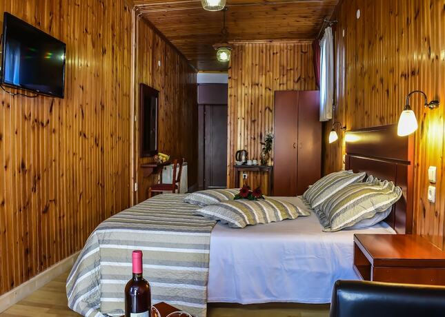 Imagen de la habitación del Hotel Tasia. Foto 17