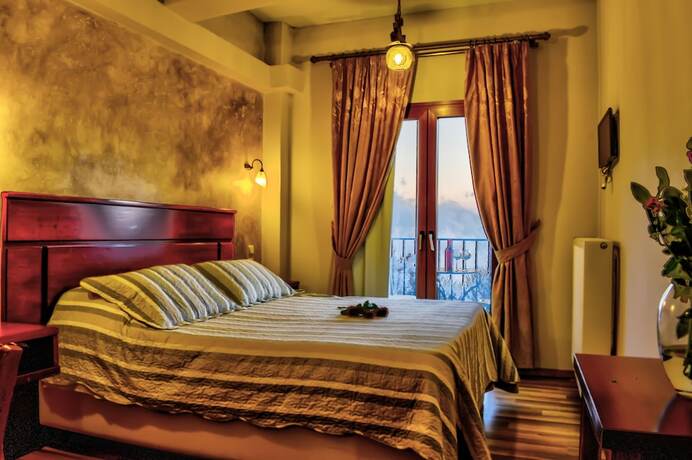 Imagen de la habitación del Hotel Tasia. Foto 19