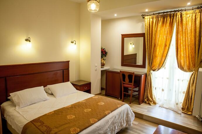 Imagen de la habitación del Hotel Tasia. Foto 20