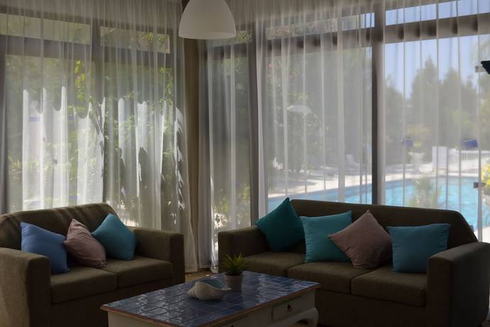 Imagen de la habitación del Hotel Tasiana Apartments Complex. Foto 11