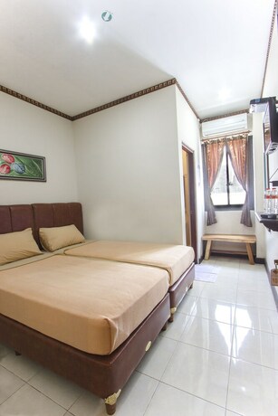 Imagen de la habitación del Hotel Tasik Jogja. Foto 5