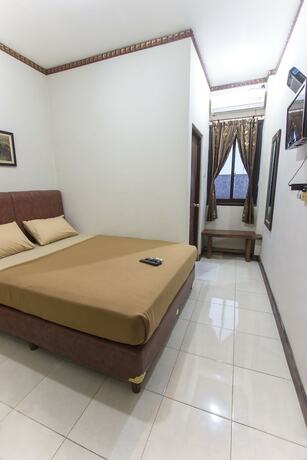 Imagen de la habitación del Hotel Tasik Jogja. Foto 6
