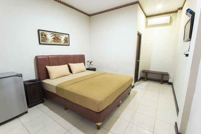Imagen de la habitación del Hotel Tasik Jogja. Foto 7