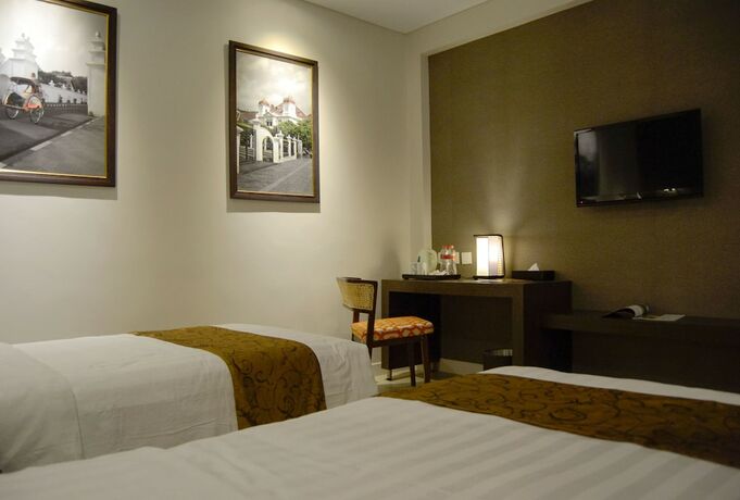 Imagen de la habitación del Hotel Tasneem Convention Yogyakarta. Foto 24