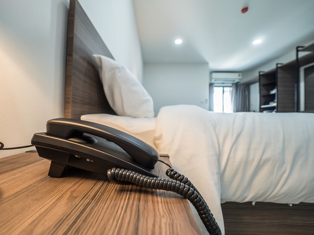 Imagen de la habitación del Hotel Tassana Place. Foto 9