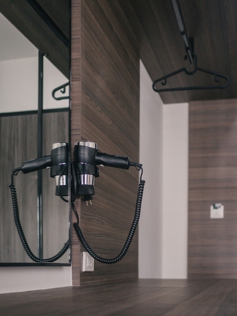 Imagen de la habitación del Hotel Tassana Place. Foto 11