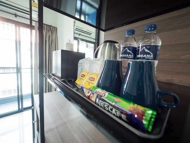 Imagen de la habitación del Hotel Tassana Place. Foto 12