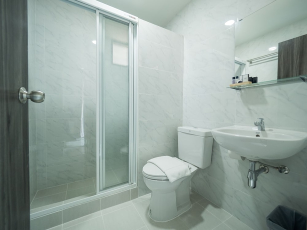 Imagen de la habitación del Hotel Tassana Place. Foto 15