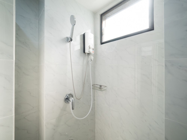 Imagen de la habitación del Hotel Tassana Place. Foto 16