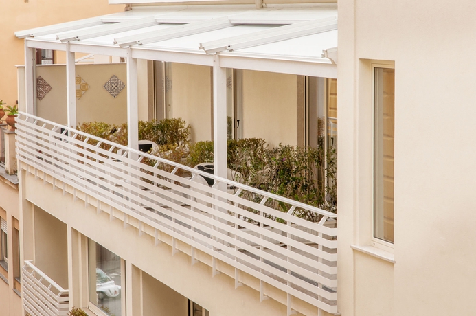 Imagen de la habitación del Hotel Tasso Suites. Foto 12