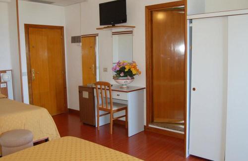 Imagen de la habitación del Hotel Tassoni Maison. Foto 6