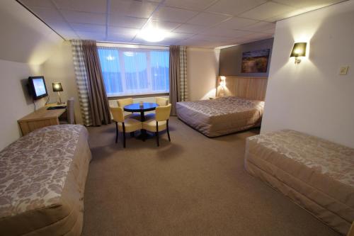 Imagen de la habitación del Hotel Tatenhove Texel. Foto 7
