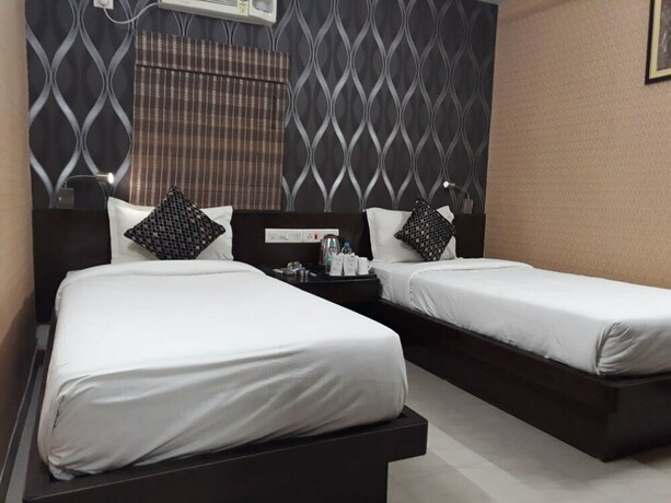 Imagen de la habitación del Hotel Tathagat. Foto 22