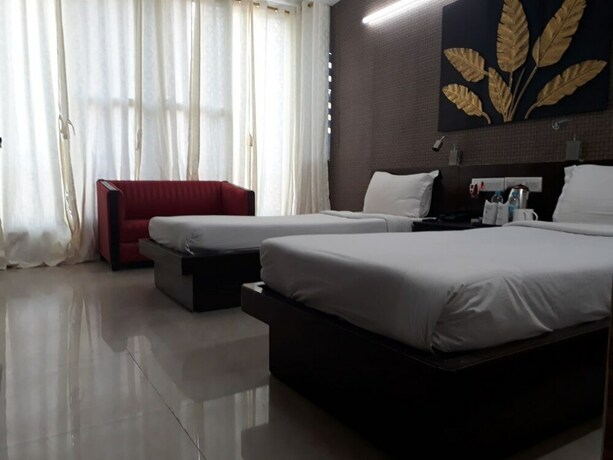 Imagen de la habitación del Hotel Tathagat. Foto 23