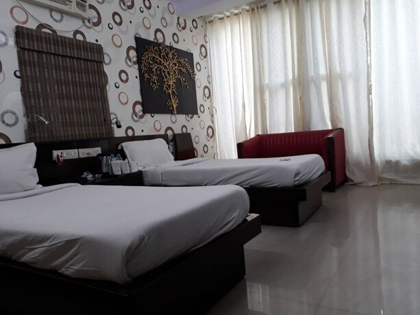 Imagen de la habitación del Hotel Tathagat. Foto 26