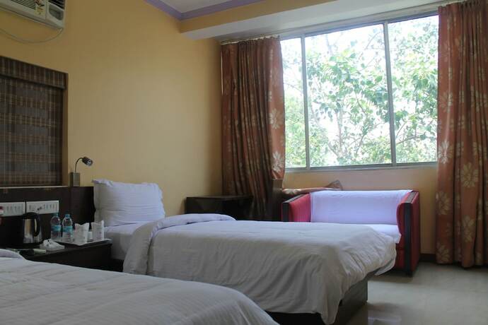Imagen de la habitación del Hotel Tathagat. Foto 29
