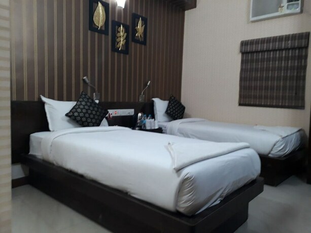 Imagen de la habitación del Hotel Tathagat. Foto 32