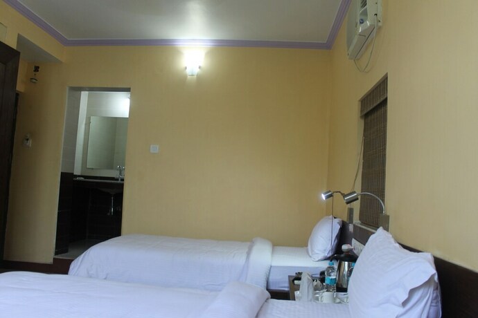 Imagen de la habitación del Hotel Tathagat. Foto 34