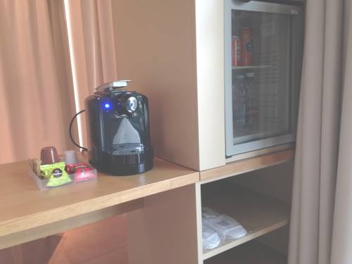 Imagen de la habitación del Hotel Tati. Foto 7