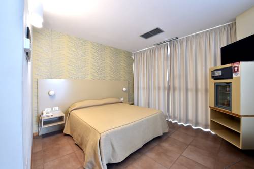 Imagen de la habitación del Hotel Tati. Foto 12