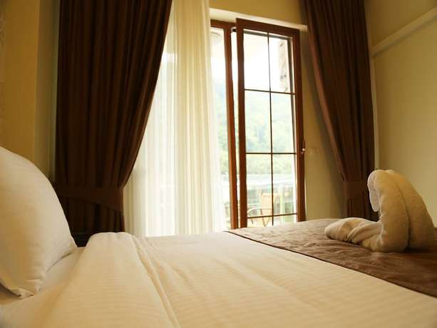 Imagen de la habitación del Hotel Tatilya Resort. Foto 7