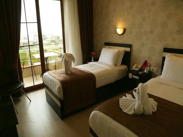 Imagen de la habitación del Hotel Tatilya Resort. Foto 8