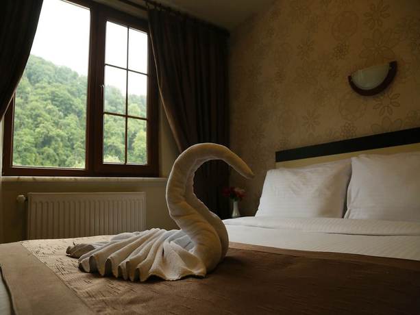 Imagen de la habitación del Hotel Tatilya Resort. Foto 9