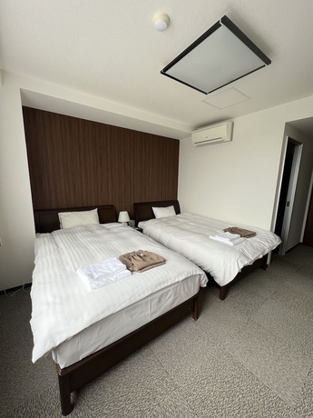 Imagen de la habitación del Hotel Tatsumi Club. Foto 10