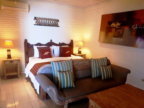 Imagen de la habitación del Hotel Tauch Terminal Resort Tulamben. Foto 23