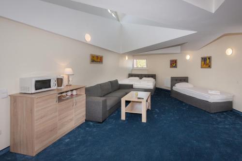 Imagen de la habitación del Hotel Tauras Center. Foto 7