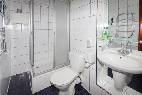 Imagen de la habitación del Hotel Tauras Center. Foto 8