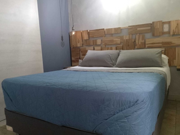Imagen de la habitación del Hotel Tauro Black Suites. Foto 3
