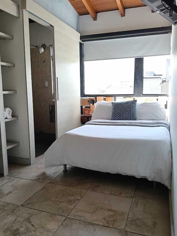 Imagen de la habitación del Hotel Tauro Black Suites. Foto 5
