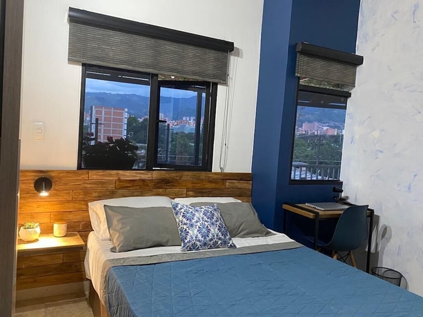 Imagen de la habitación del Hotel Tauro Black Suites. Foto 9
