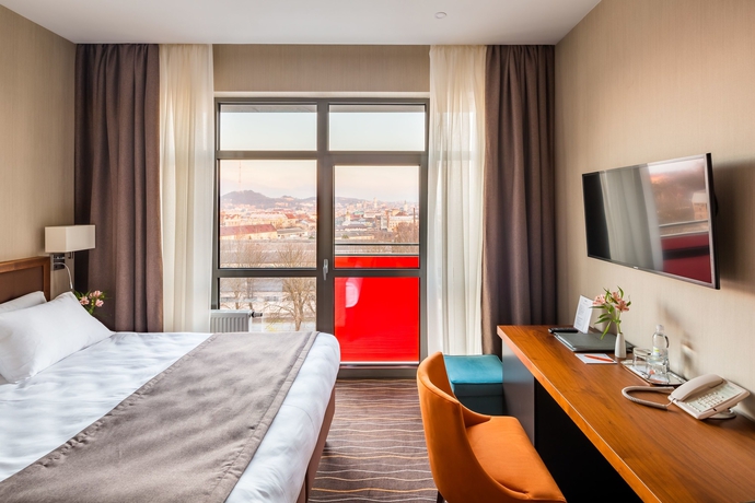 Imagen de la habitación del Hotel Taurus City. Foto 11