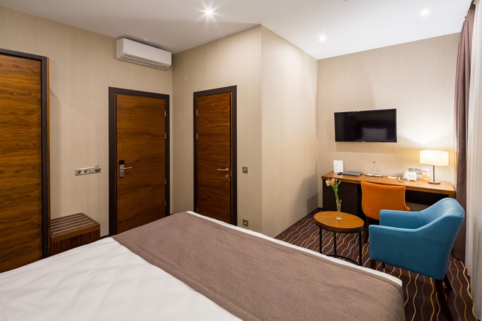 Imagen de la habitación del Hotel Taurus City. Foto 12