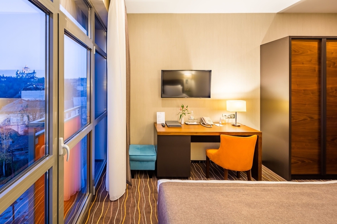 Imagen de la habitación del Hotel Taurus City. Foto 13