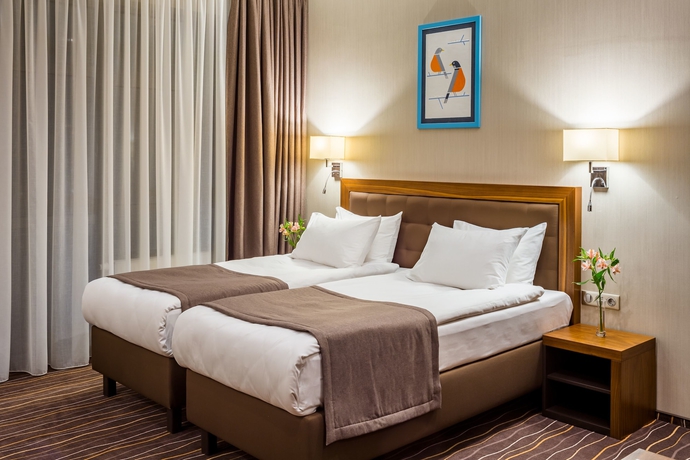 Imagen de la habitación del Hotel Taurus City. Foto 14